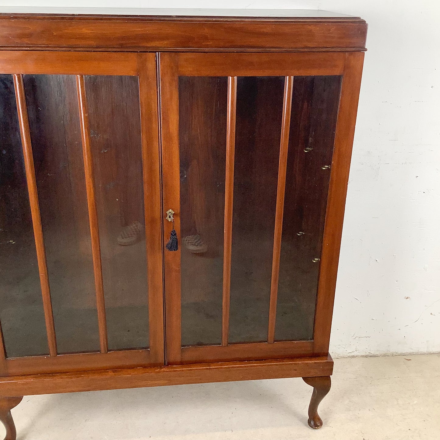 Classic Glass-Front Bookcase with Paneled Doors and Sculpted Legs