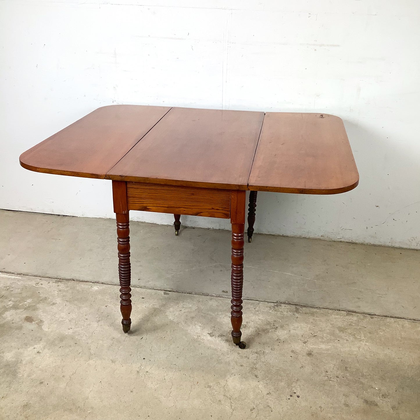 Antique American Drop-Leaf Table | Victorian Spool-Turned Legs | Original Brass Casters | Hardwood Top