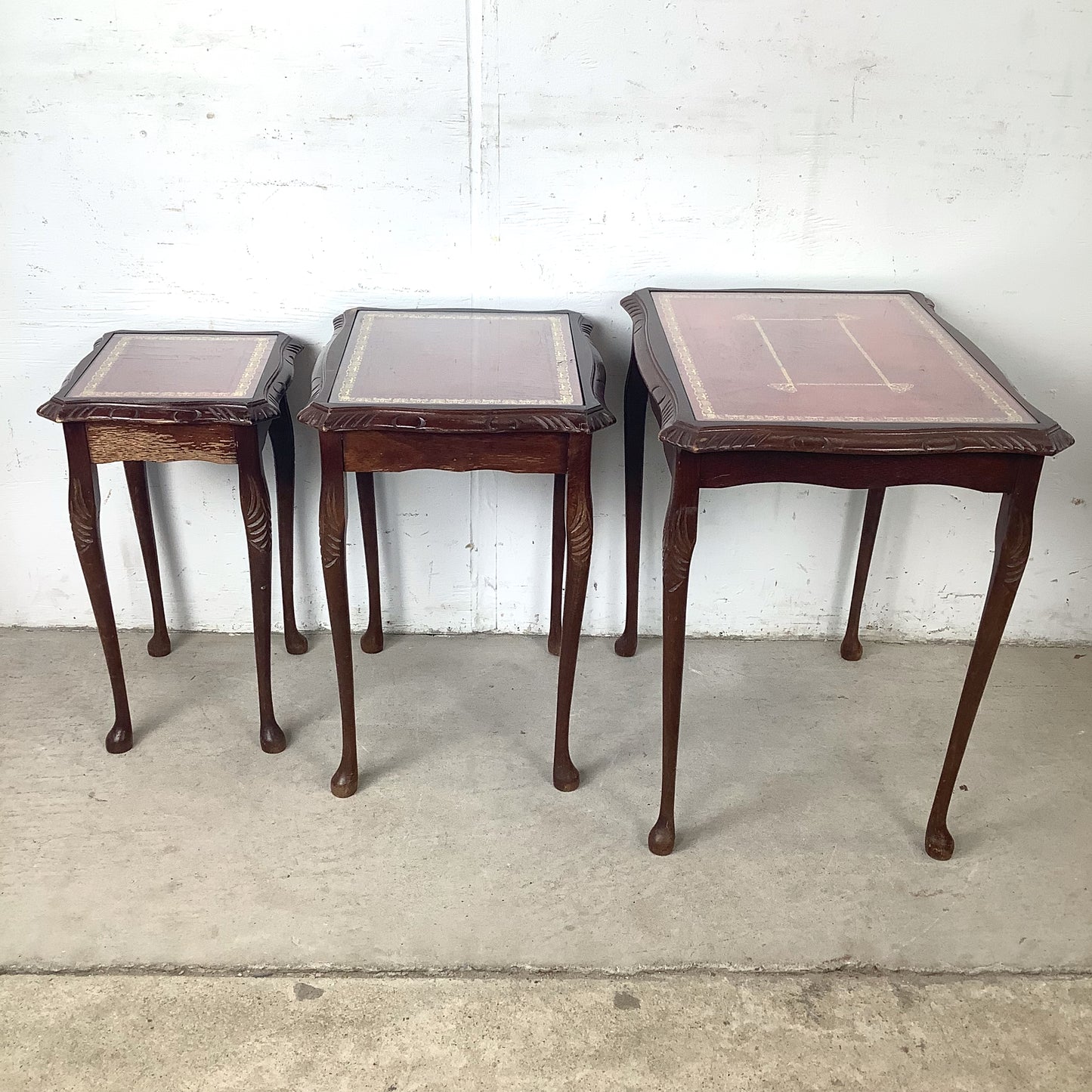 Vintage Queen Anne Style Nesting Tables with Tooled Leather Tops – Set of Three