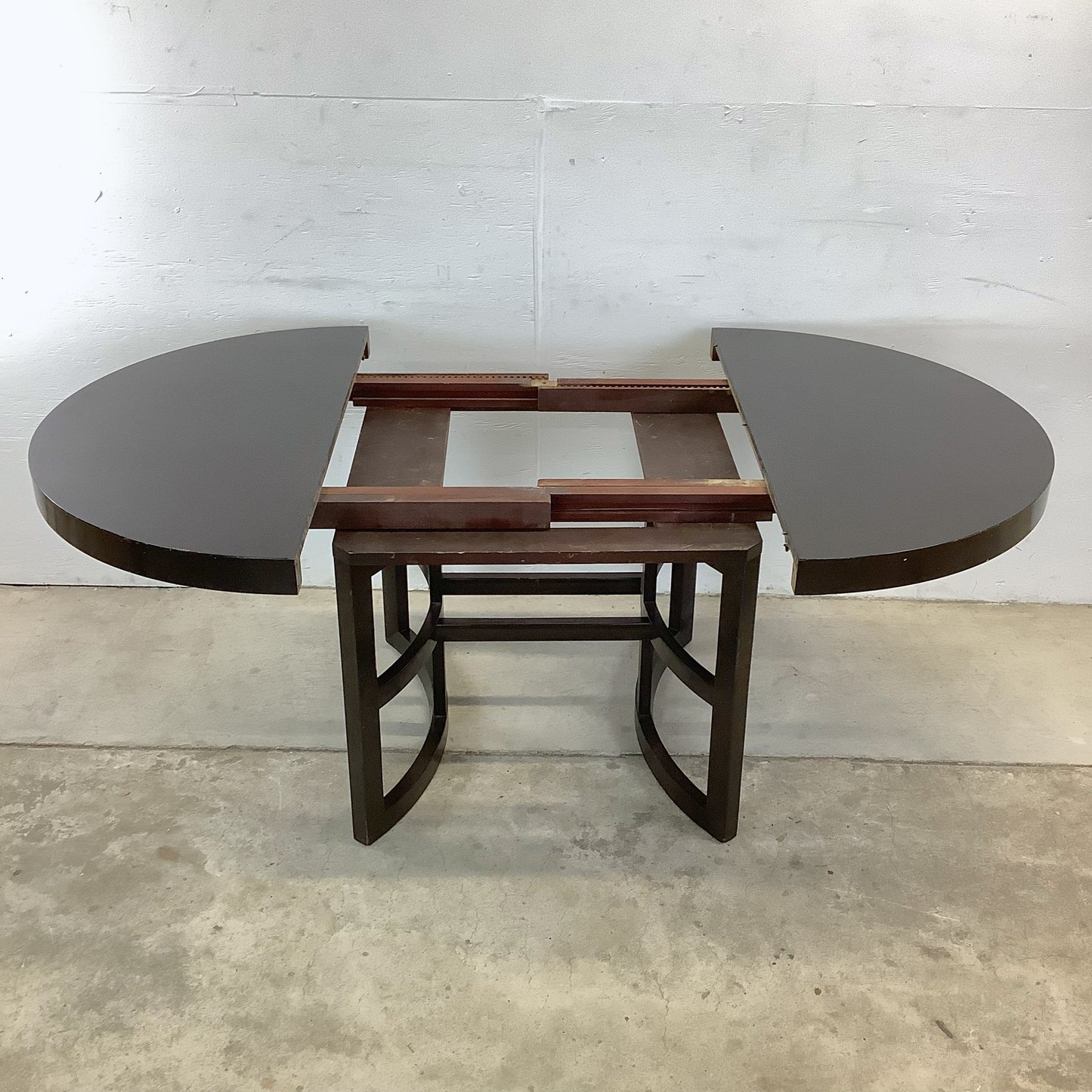 Ebonized Mahogany Round Extension Dining Table — Attributed to Paul T. Frankl