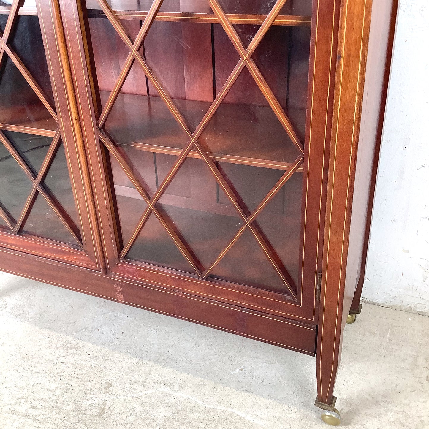 Edwardian Revival Mahogany Diamond Lattice Glazed Bookcase | Satinwood Inlay | Brass Casters