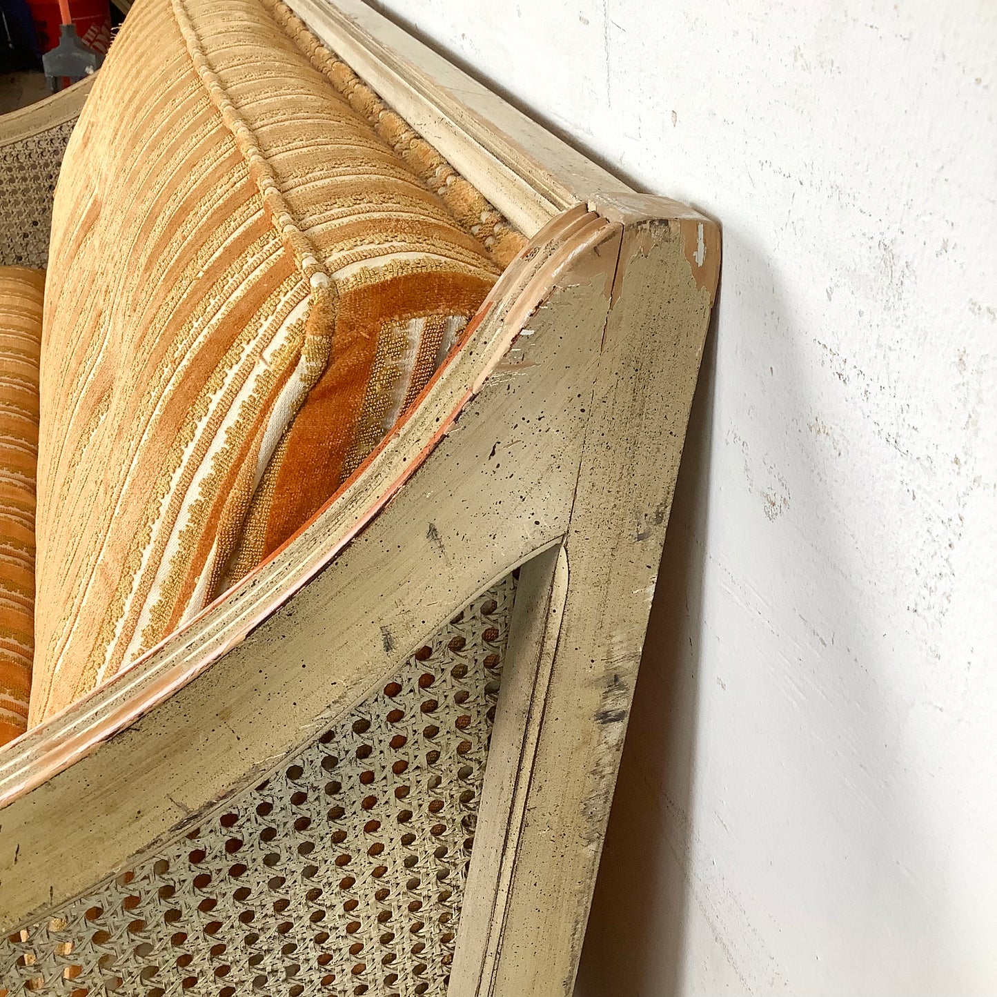 French Louis XVI Style Cane Settee With Elegant Striped Upholstery