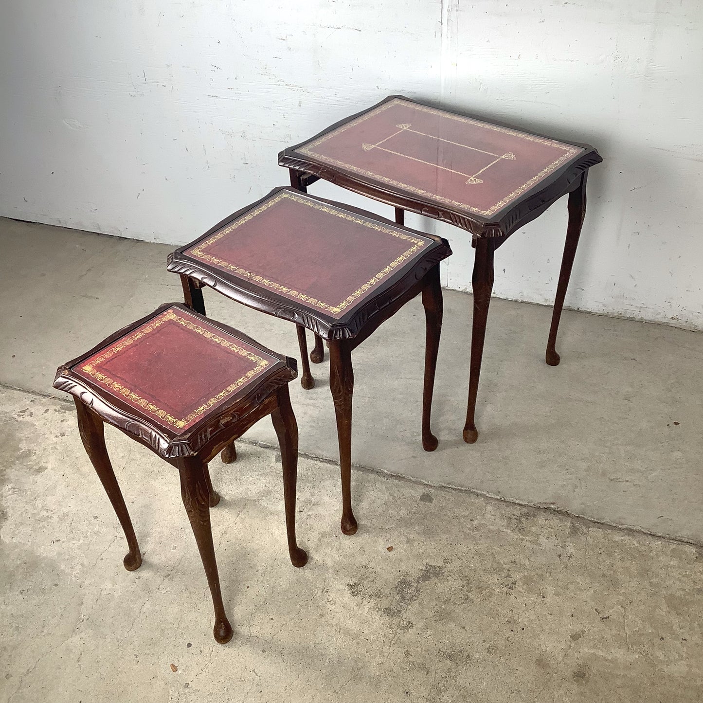Vintage Queen Anne Style Nesting Tables with Tooled Leather Tops – Set of Three