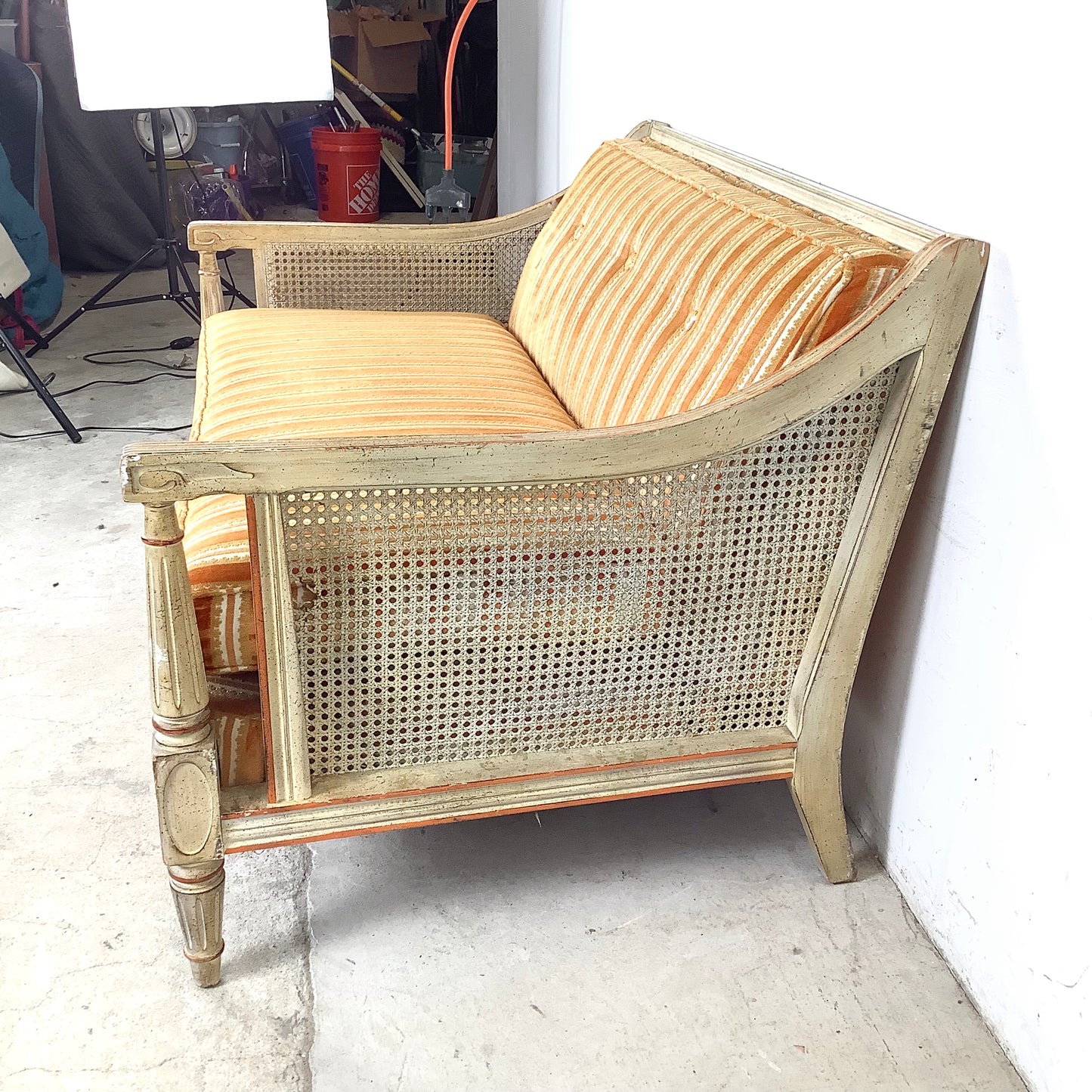 French Louis XVI Style Cane Settee With Elegant Striped Upholstery