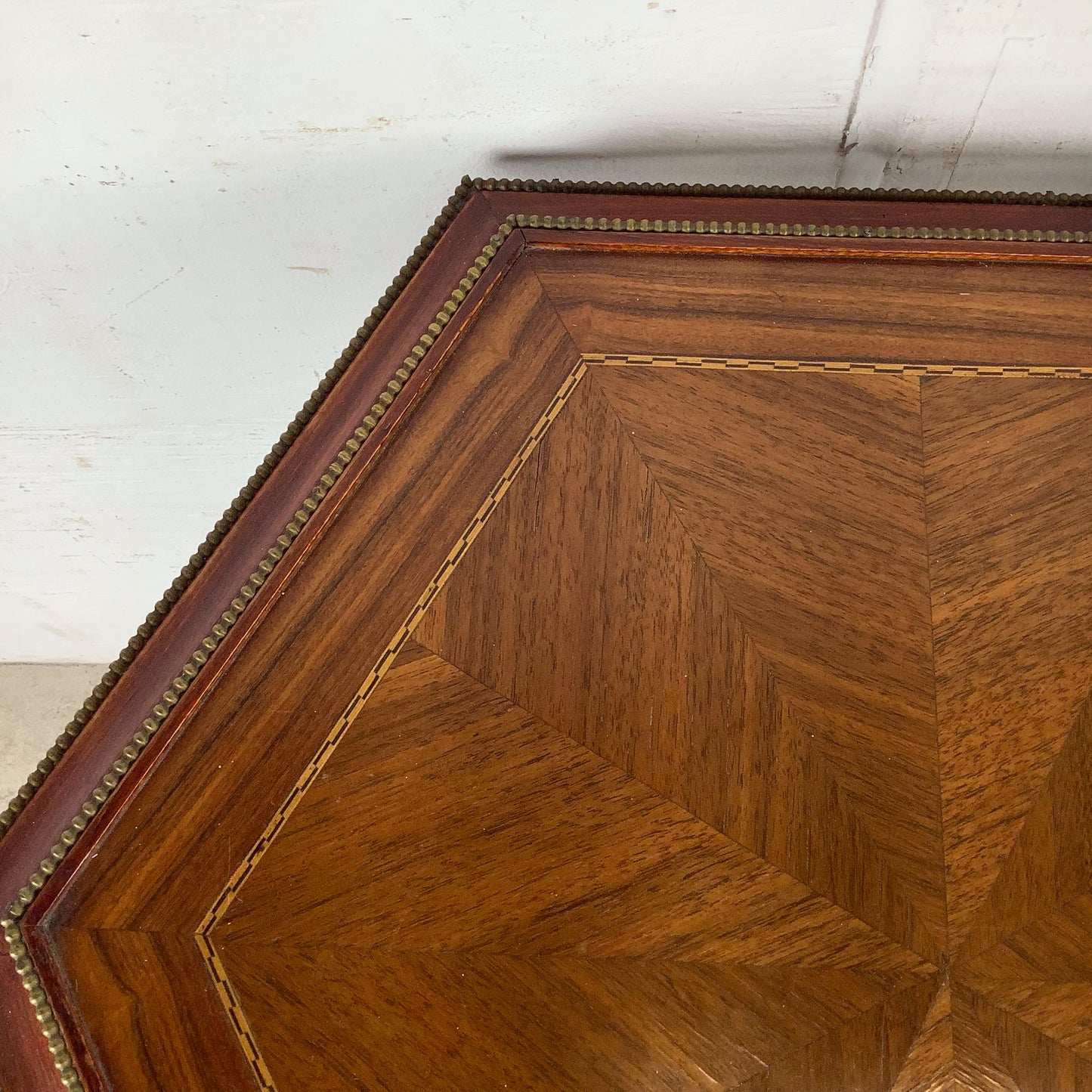 Ornate Pedestal Display Table with Brass Figural Accents