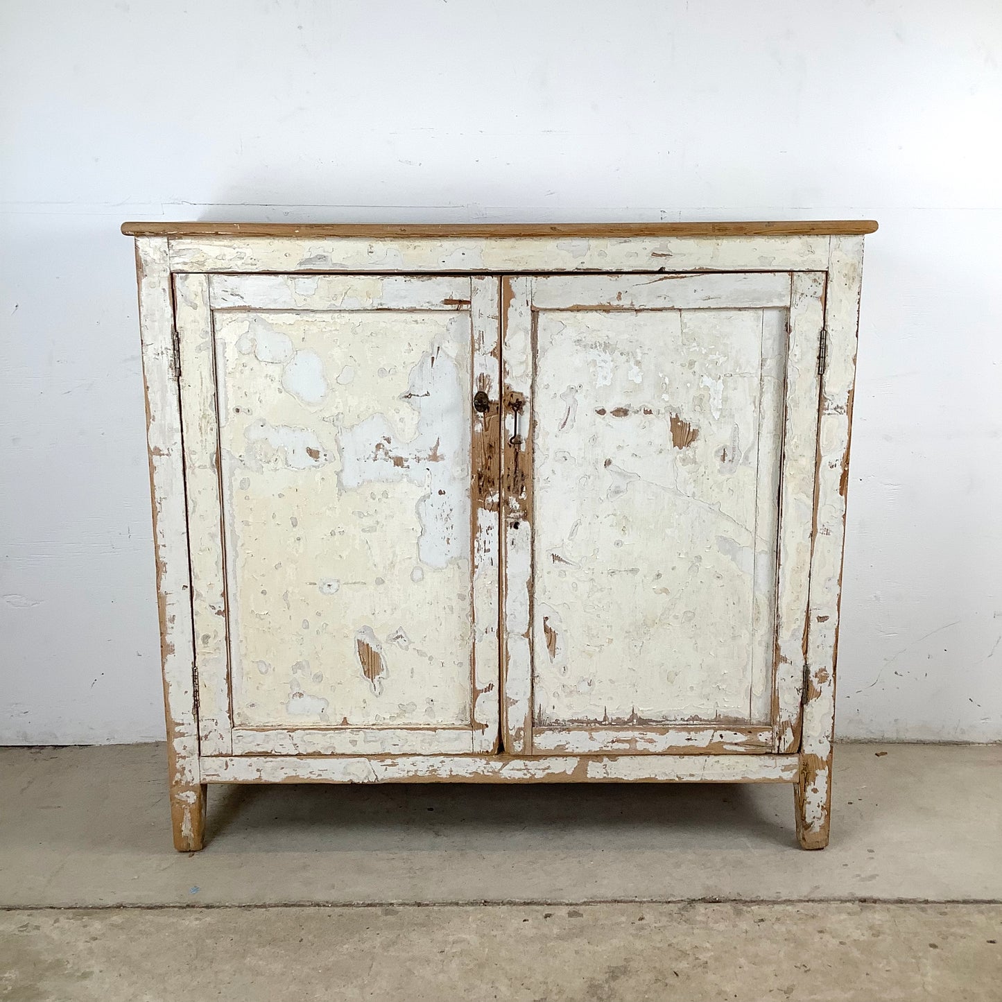 Rustic 20th Century Two-Door Cabinet – Distressed White Patina with Ample Storage