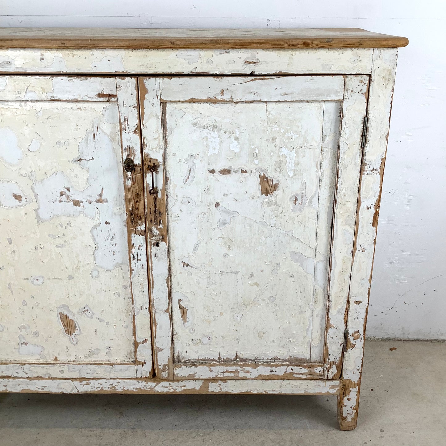 Rustic 20th Century Two-Door Cabinet – Distressed White Patina with Ample Storage