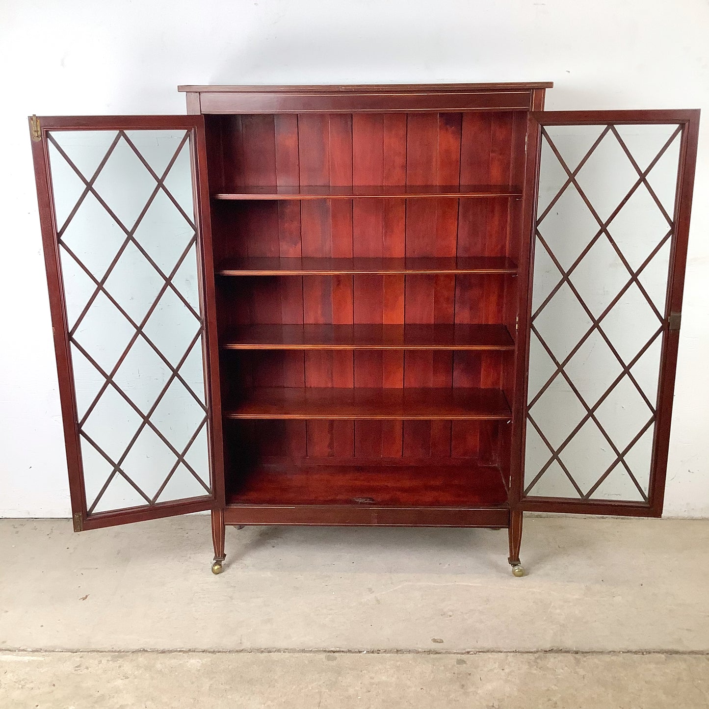 Edwardian Revival Mahogany Diamond Lattice Glazed Bookcase | Satinwood Inlay | Brass Casters