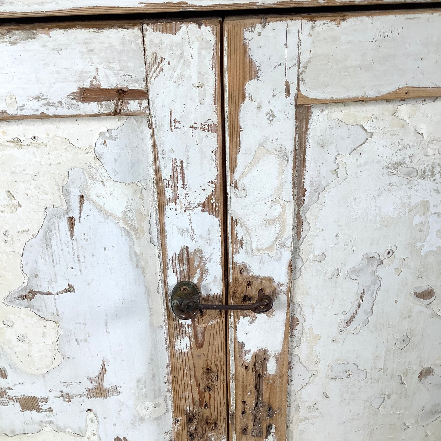 Rustic 20th Century Two-Door Cabinet – Distressed White Patina with Ample Storage