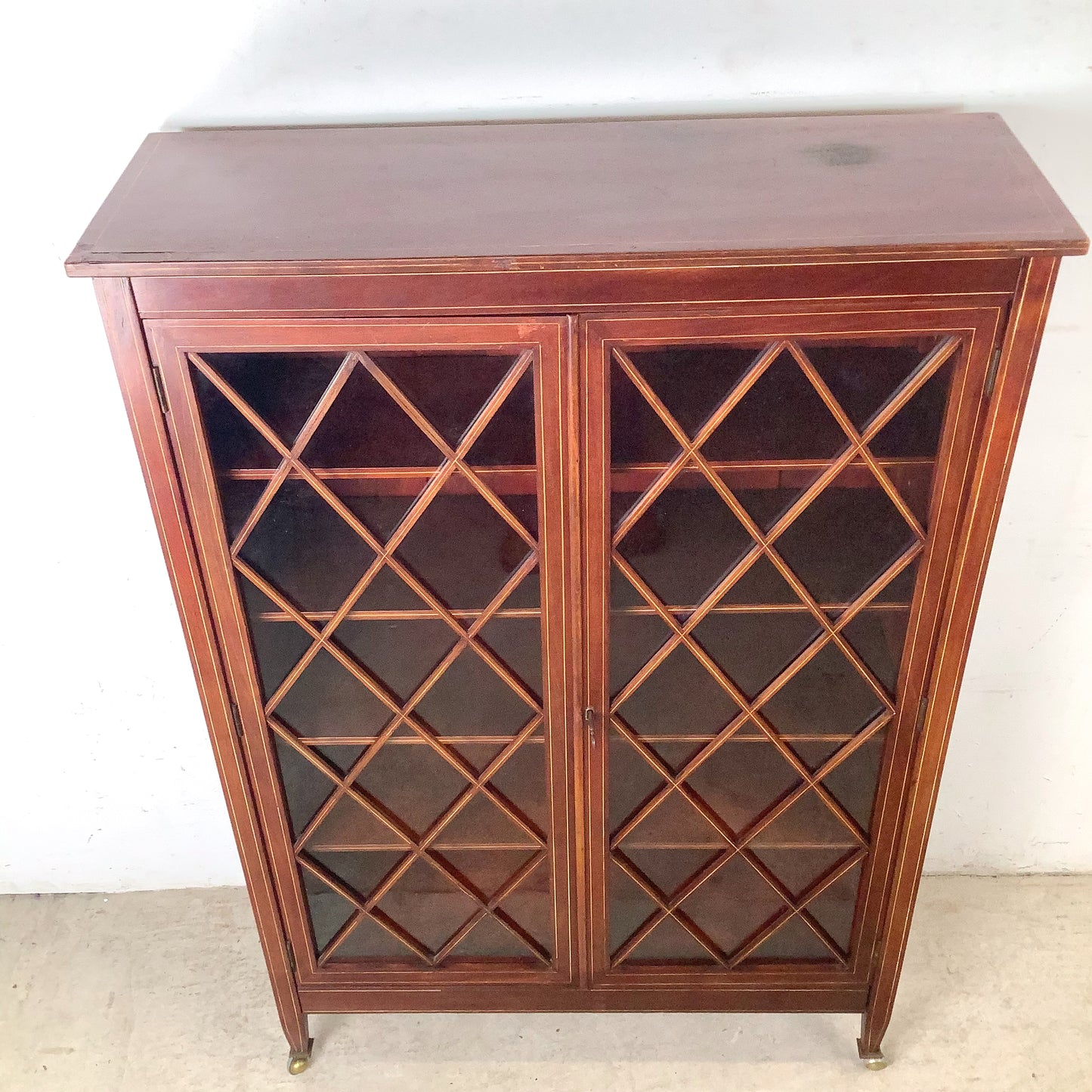 Edwardian Revival Mahogany Diamond Lattice Glazed Bookcase | Satinwood Inlay | Brass Casters