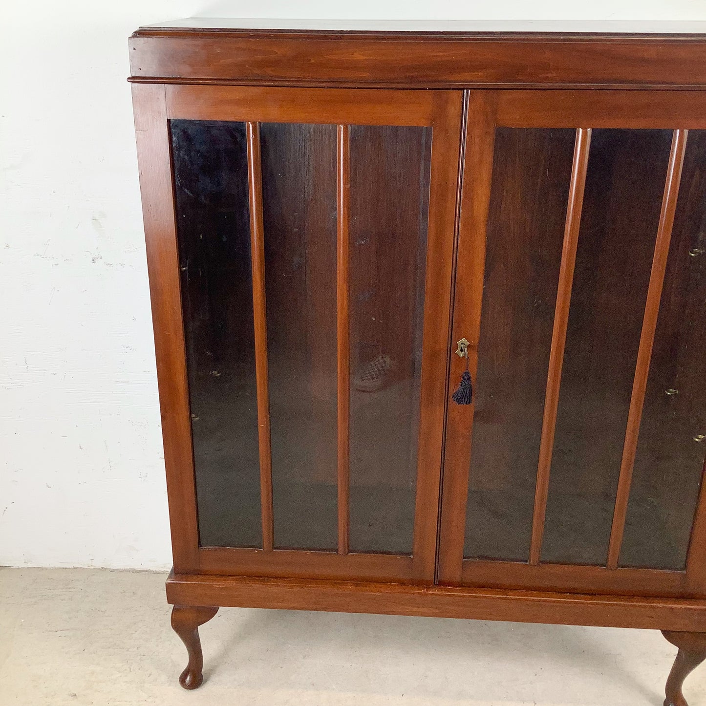 Classic Glass-Front Bookcase with Paneled Doors and Sculpted Legs