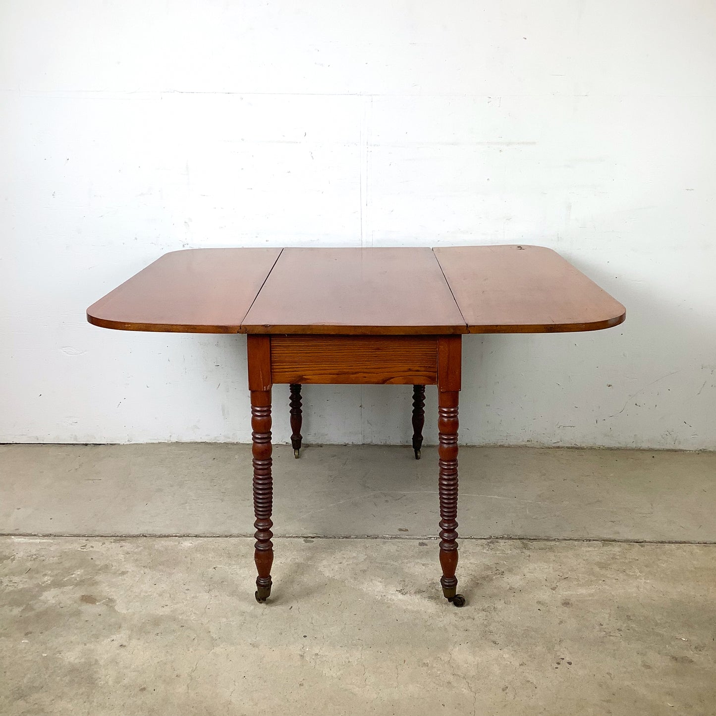Antique American Drop-Leaf Table | Victorian Spool-Turned Legs | Original Brass Casters | Hardwood Top