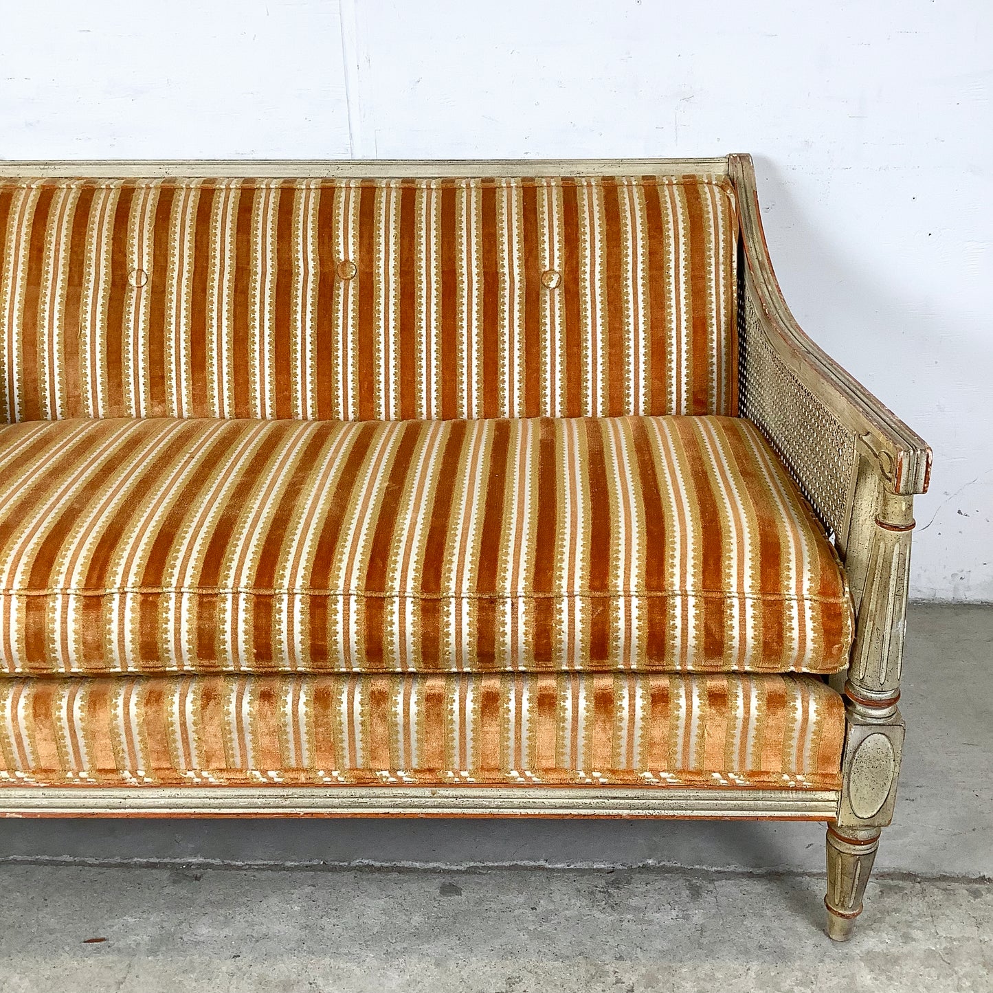 French Louis XVI Style Cane Settee With Elegant Striped Upholstery