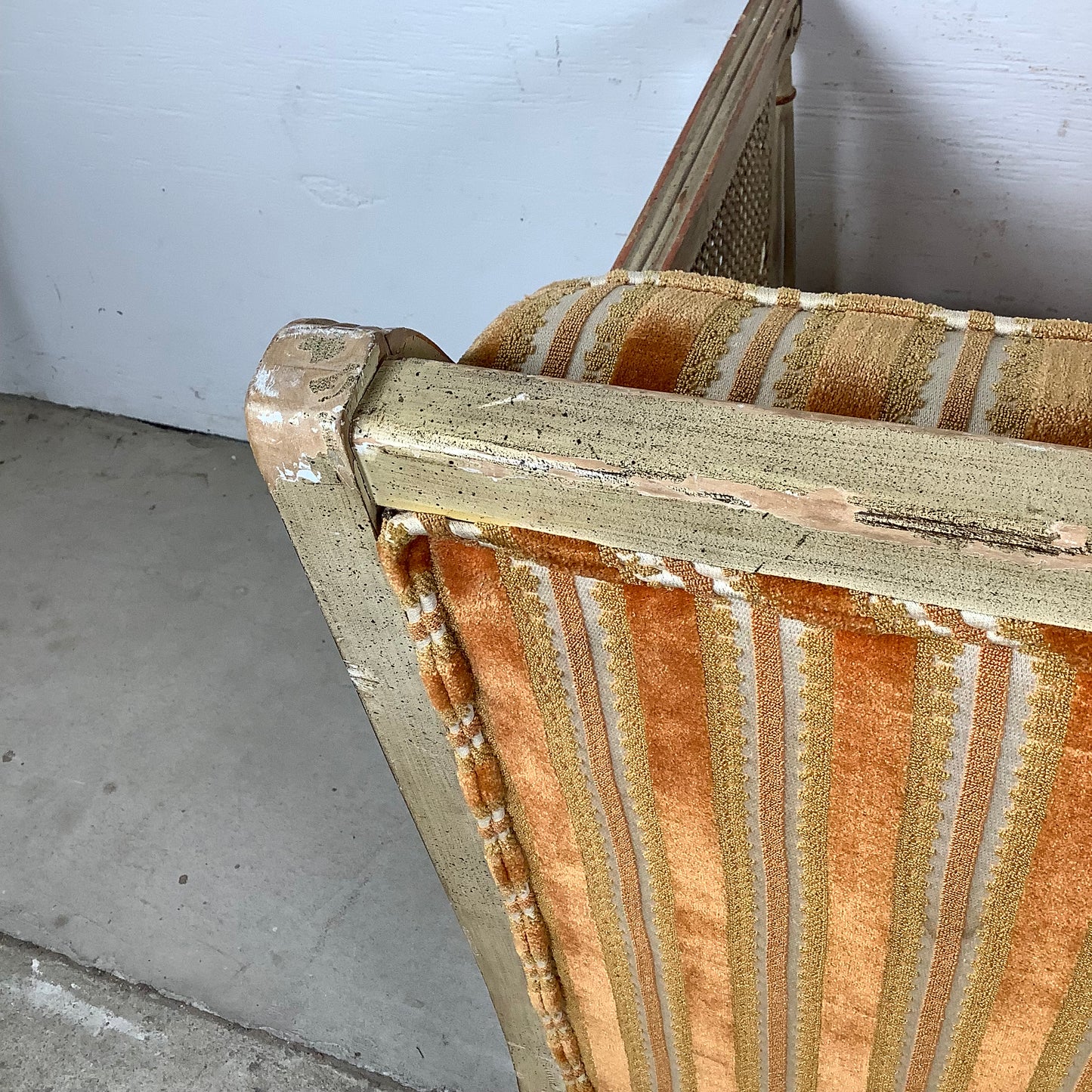 French Louis XVI Style Cane Settee With Elegant Striped Upholstery