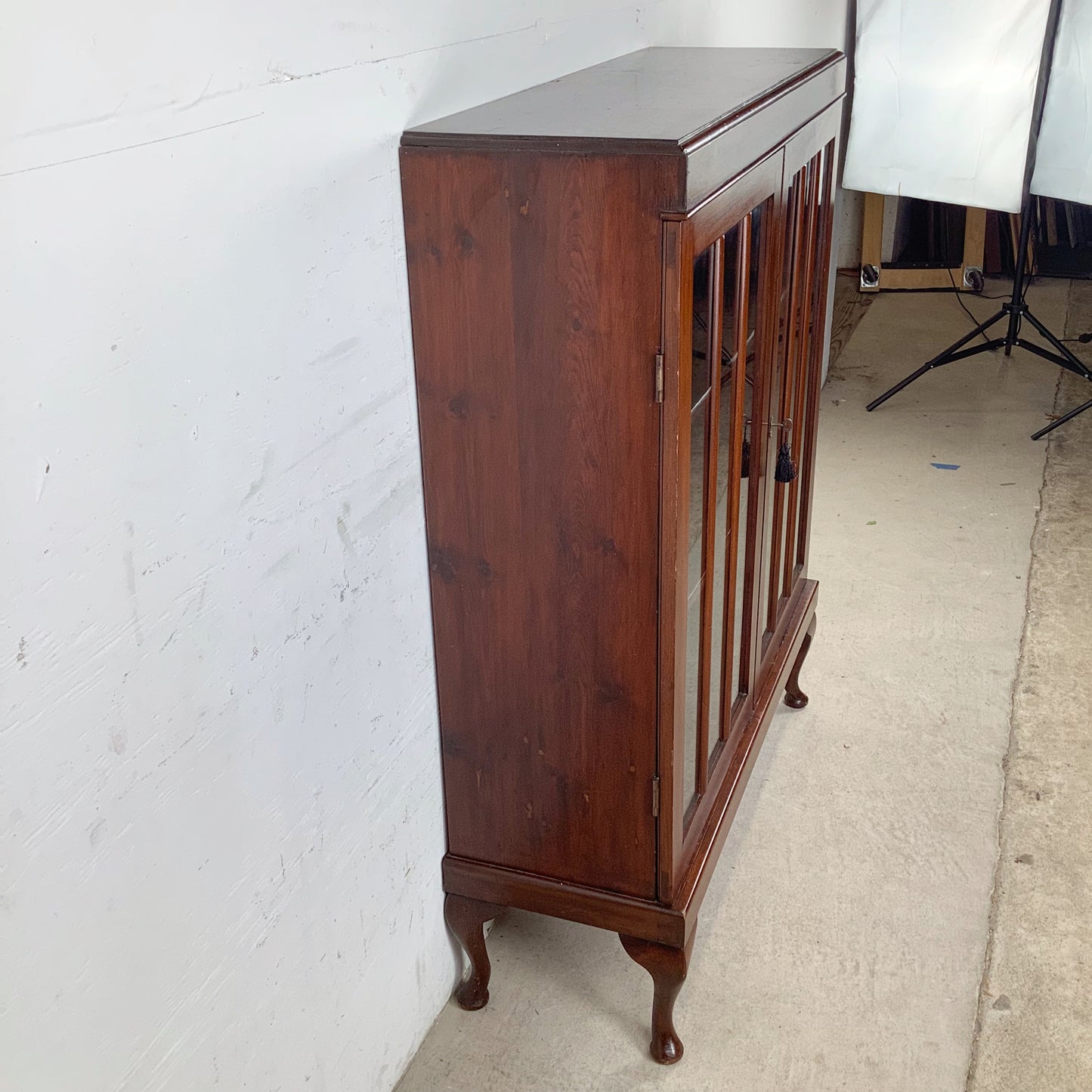 Classic Glass-Front Bookcase with Paneled Doors and Sculpted Legs