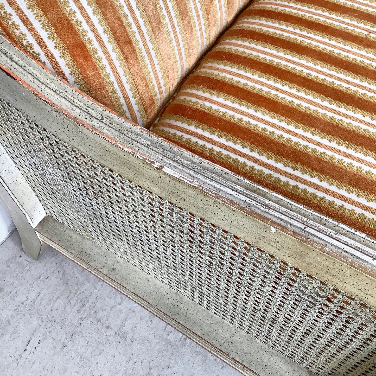 French Louis XVI Style Cane Settee With Elegant Striped Upholstery