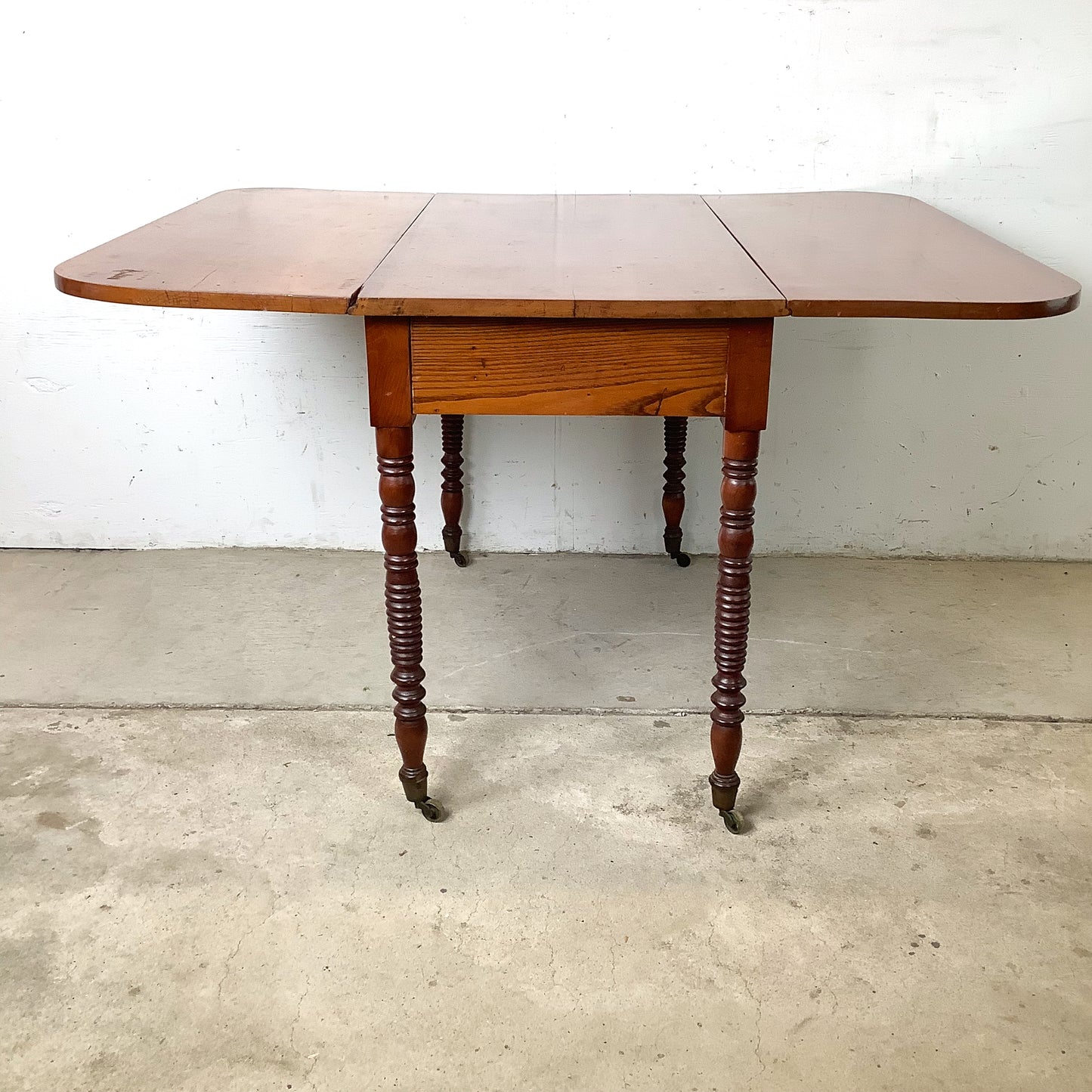 Antique American Drop-Leaf Table | Victorian Spool-Turned Legs | Original Brass Casters | Hardwood Top