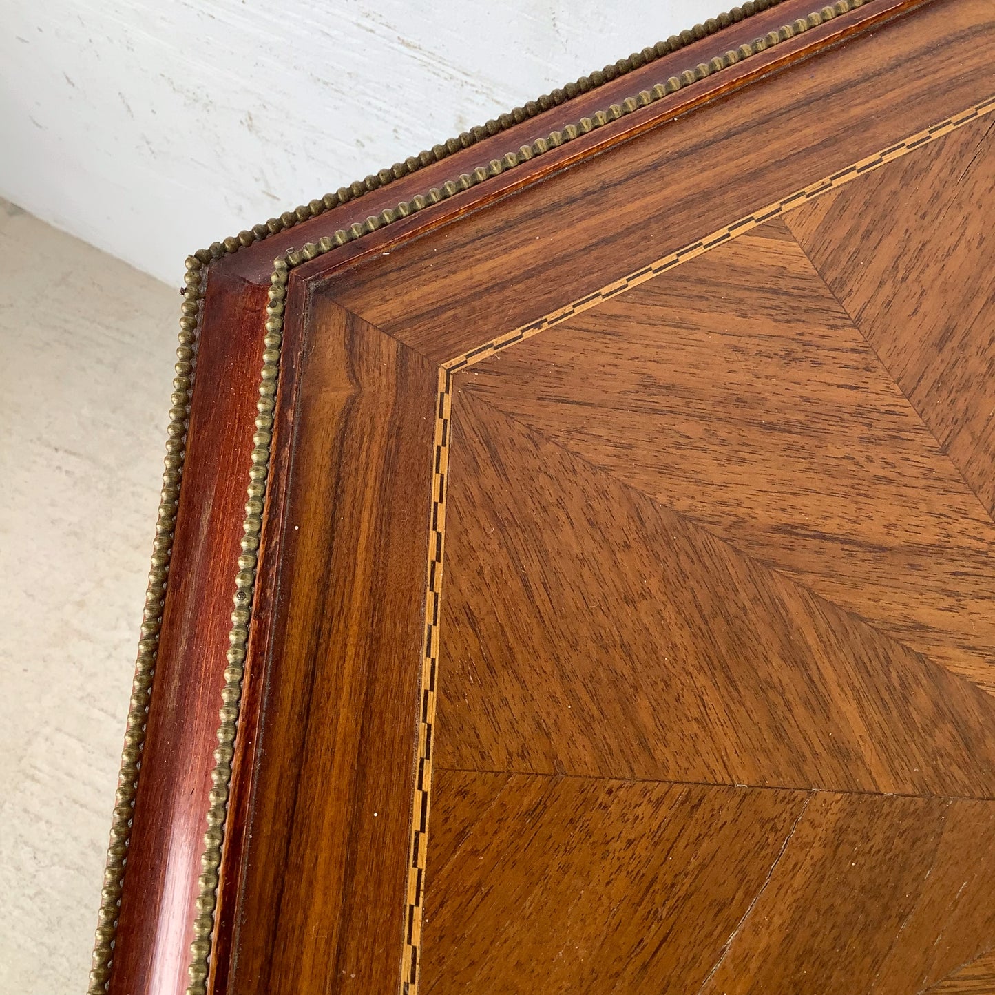 Ornate Pedestal Display Table with Brass Figural Accents